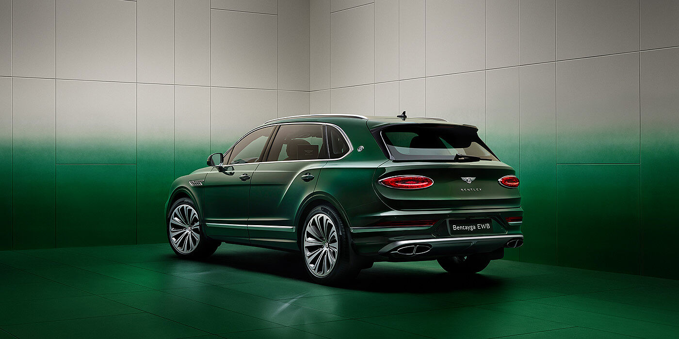 Bentley Hamburg Bentley Bentayga Extended Wheelbase SUV Rear three quarter view in Light Emerald green paint in green and grey room