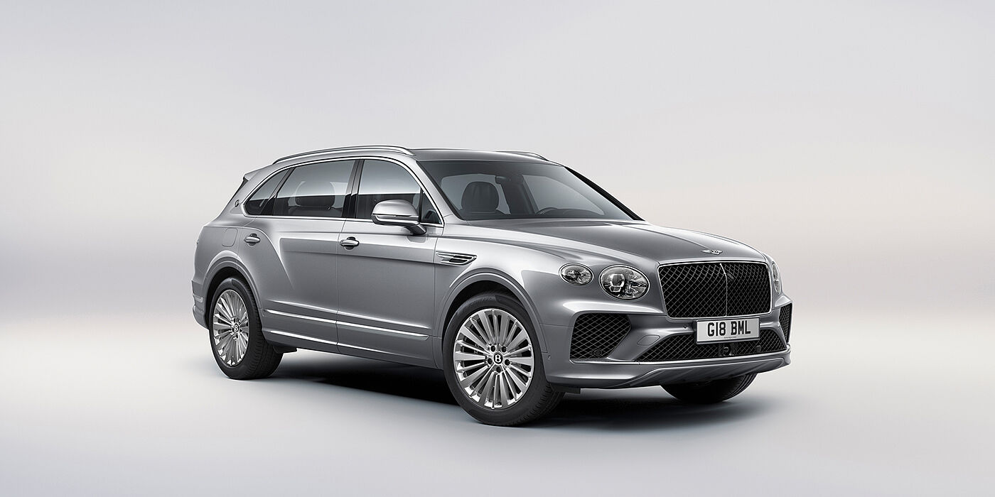 Bentley Hamburg Bentley Bentayga Extended Wheelbase luxury SUV front three quarter view in Moonbeam paint with 21 inch five spoke painted wheels
