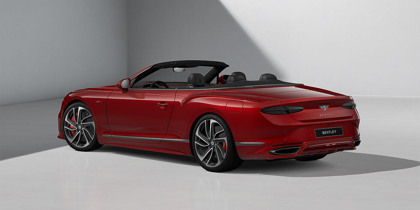 Bentley Hamburg Bentley Continental GTC Speed convertible in Dragon Red paint and 22" swept spoke wheels - rear 3/4