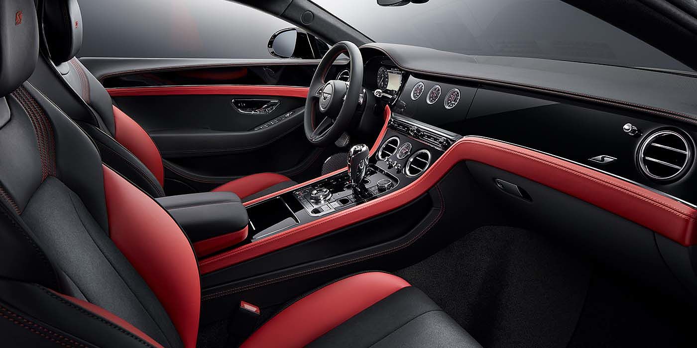 Bentley Hamburg Bentley Continental GT S coupe front interior in Beluga black and Hotspur red hide with high gloss Carbon Fibre veneer