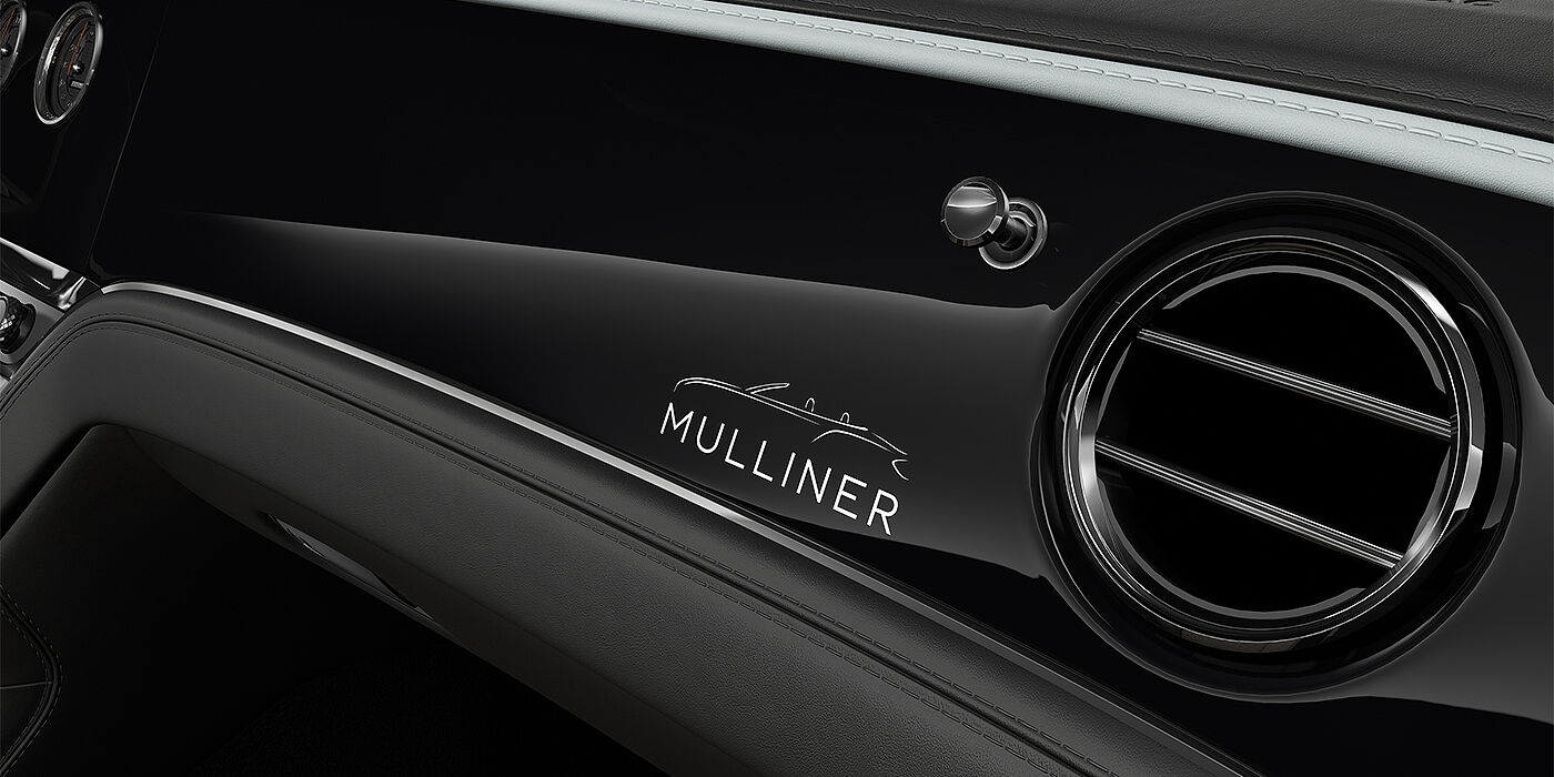 Bentley Hamburg Bentley Continental GTC Mulliner coupe veneer detail in Grand Black veneer with Diamond Milled console