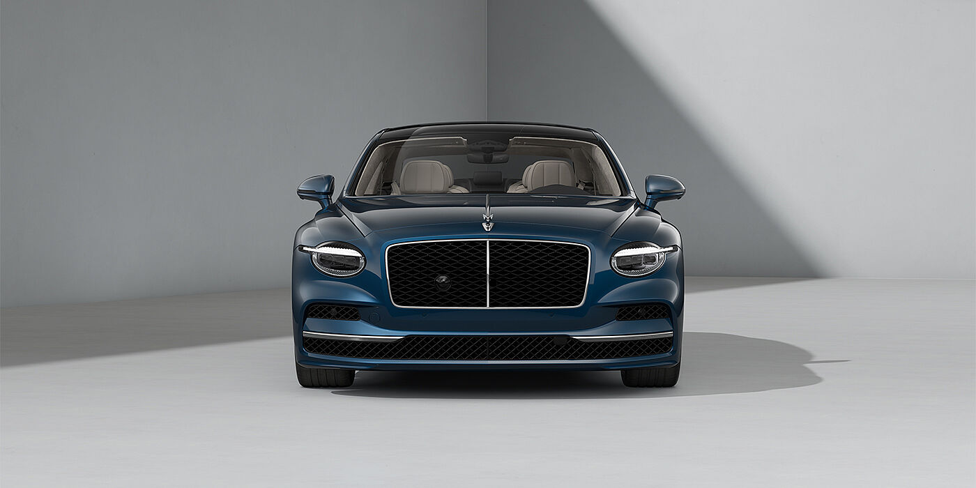 Bentley Hamburg New Bentley Flying Spur sedan in Marlin blue paint full front with 22" Ten Spoke Black Painted and Bright Machined wheels