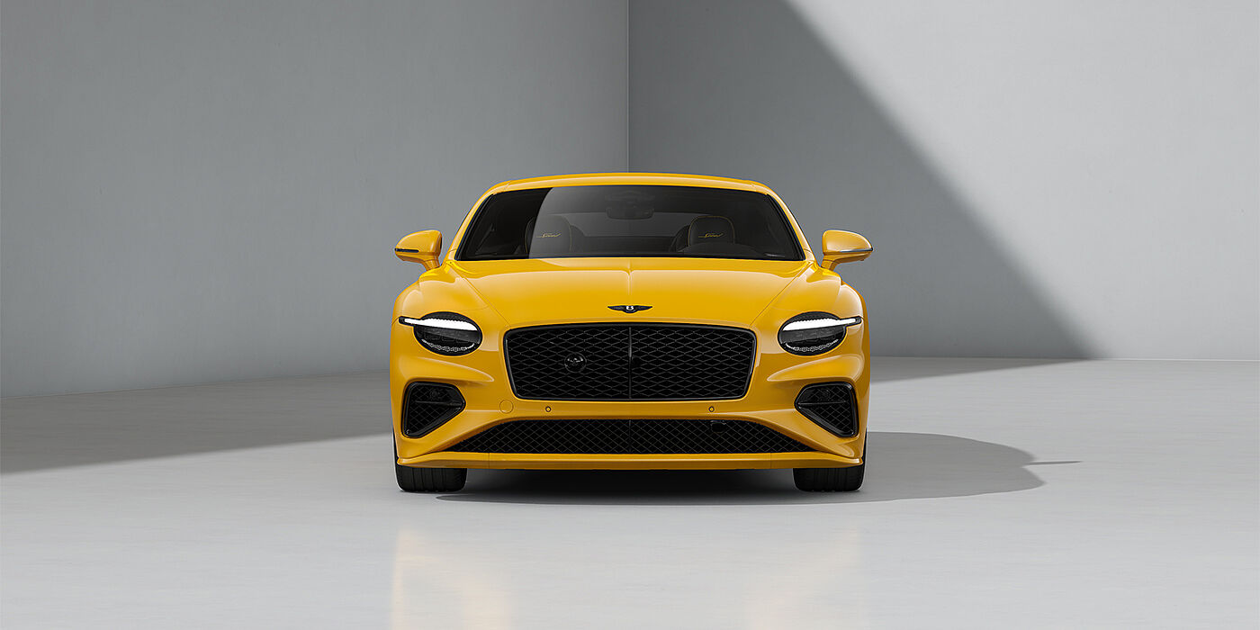 Bentley Hamburg Bentley Continental GT Speed coupe in Monaco Yellow paint and 22" Ten spoke sport wheels - full front