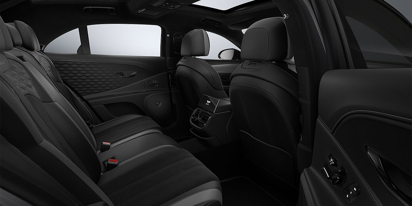 Bentley Hamburg New Bentley Flying Spur Speed sedan rear interior in Gravity Grey and Beluga Black hides with Diamond Brushed Dark Tint Aluminium veneer