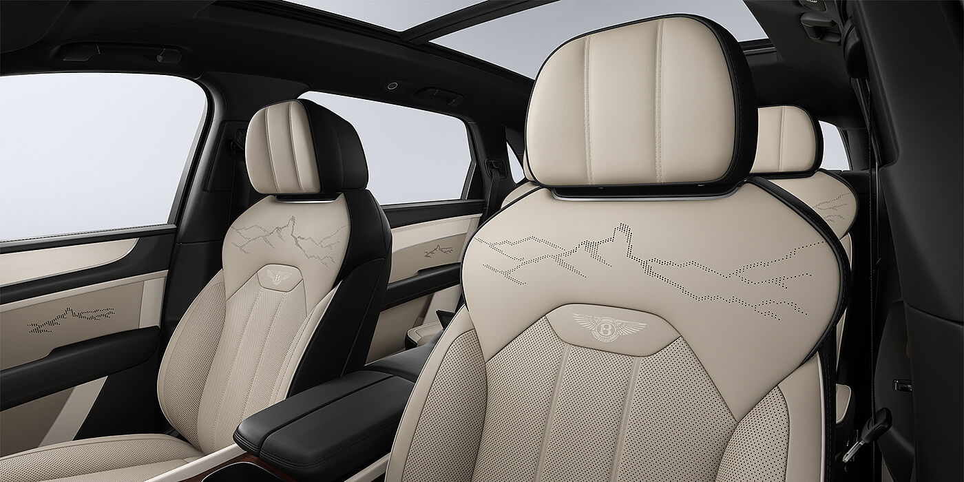 Bentley Hamburg Bentayga EWB Artenara Edition SUV front seats in Portand and Beluga Black hides and Artenara stitch detail