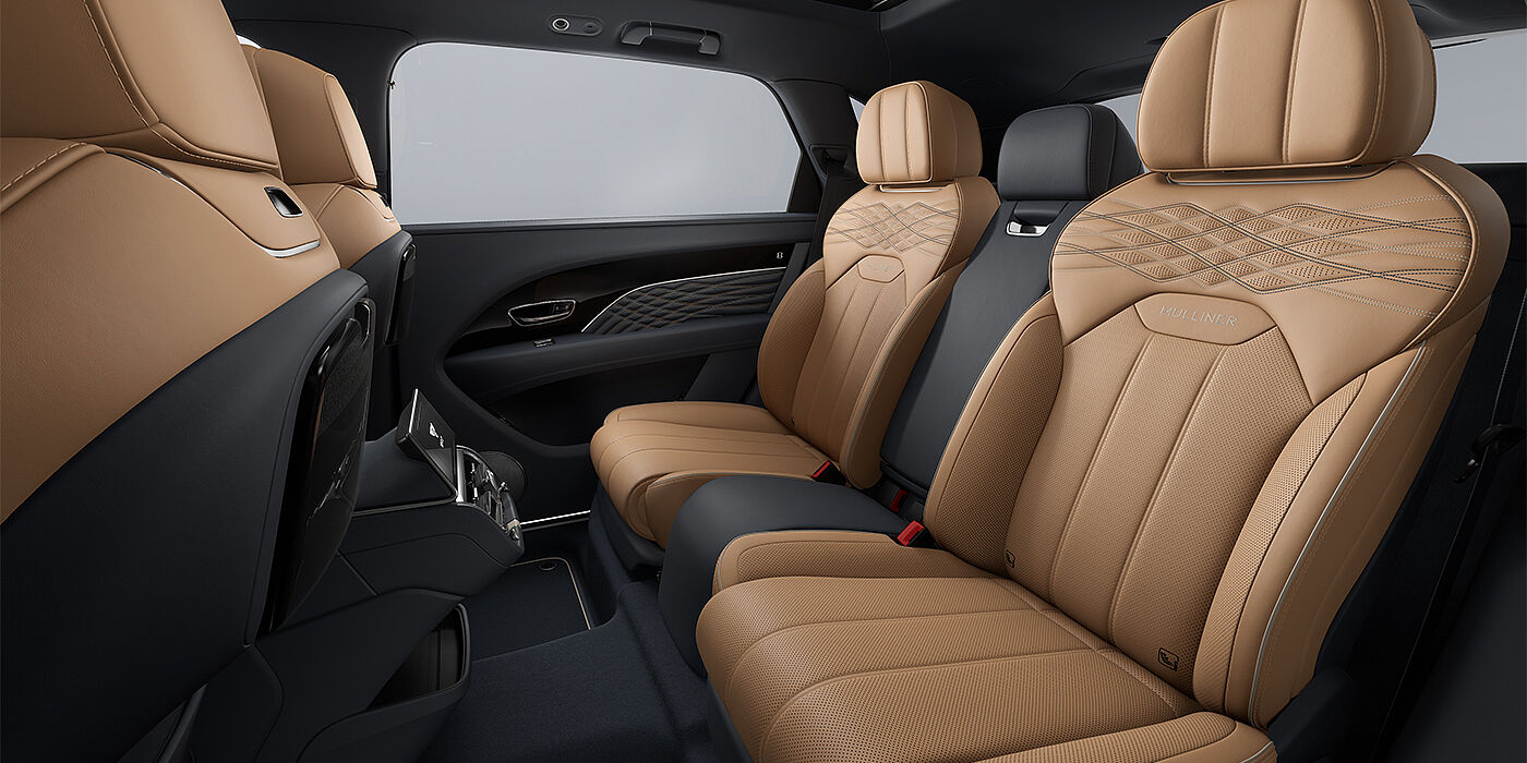 Bentley Hamburg Bentley Bentayga EWB Mulliner SUV rear interior in Camel and Brunel hides with Mulliner contrast stitching