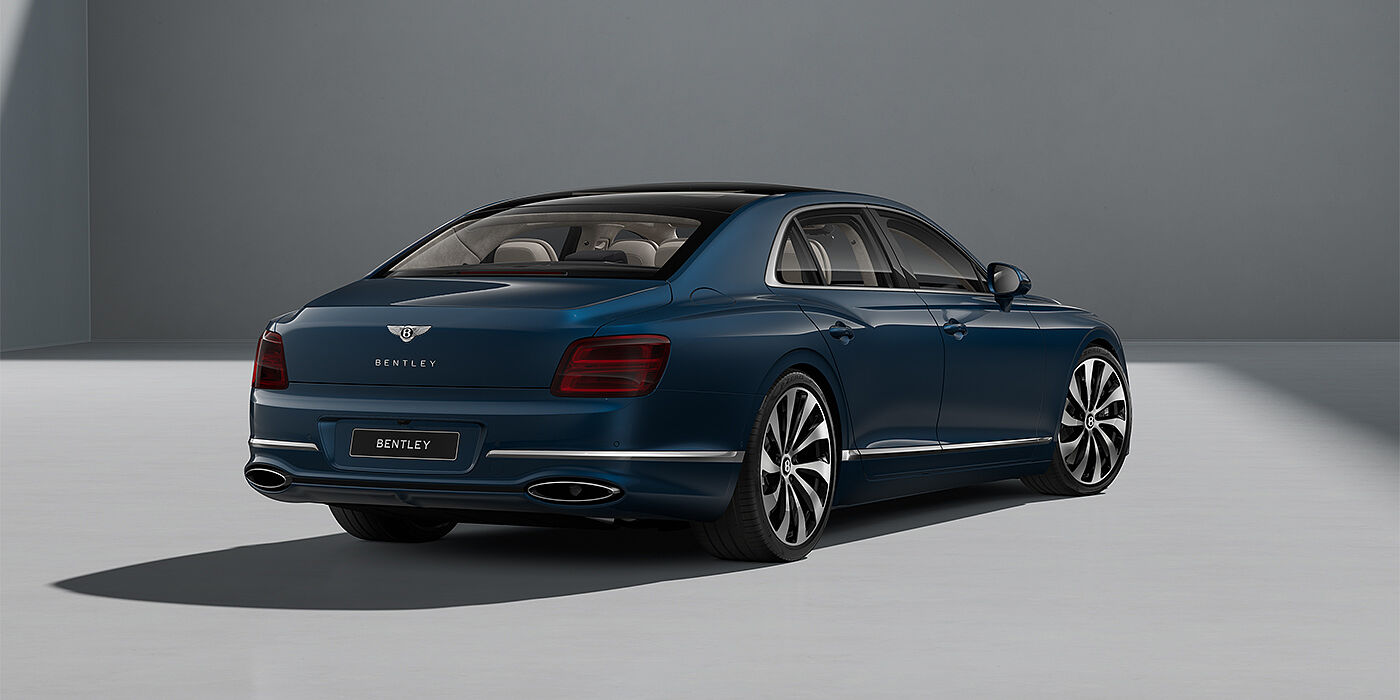 Bentley Hamburg New Bentley Flying Spur sedan in Marlin blue paint rear 3/4 with 22" Ten Spoke Black Painted and Bright Machined wheels