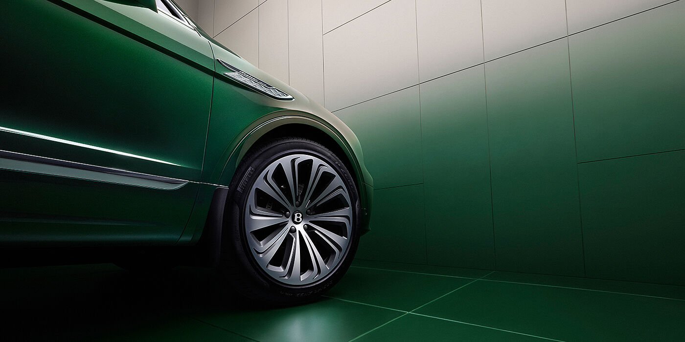 Bentley Hamburg Bentley Bentayga Extended Wheelbase Atelier Edition SUV in Light Emerald green paint front side detail with 22 inch 10 spoke wheel