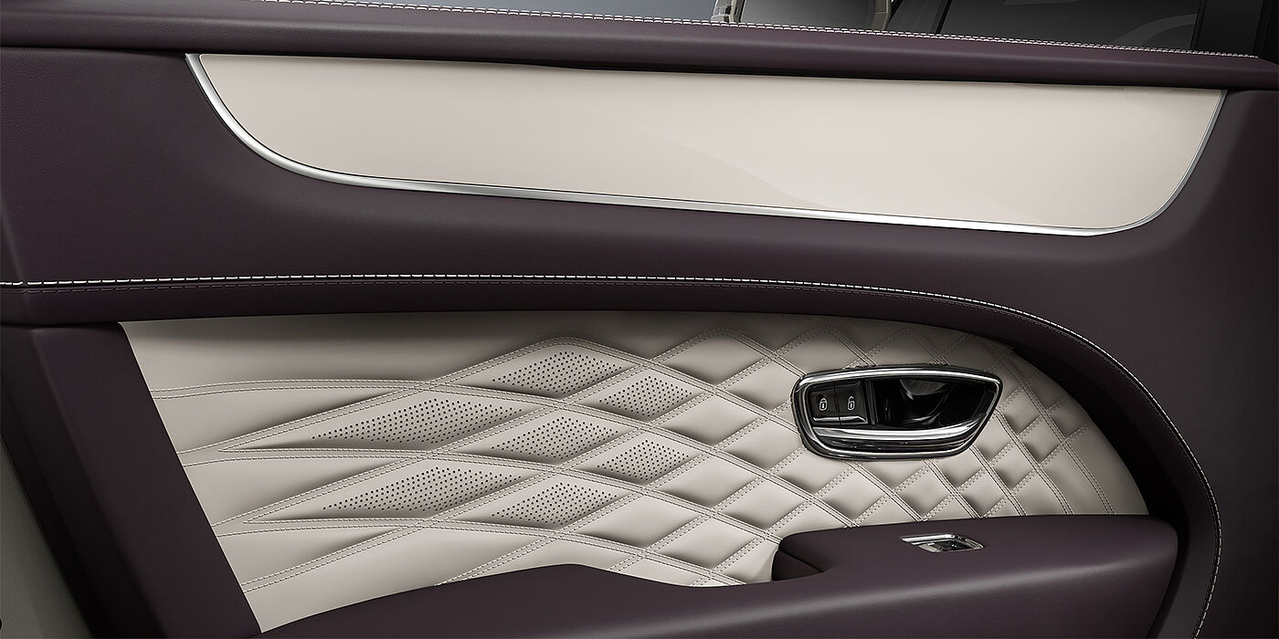 Bentley Hamburg Bentley Bentayga EWB Azure SUV door interior detail in Linen and Damson hides with Piano Linen veneer