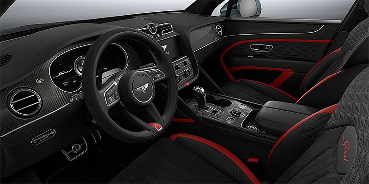 Bentley Hamburg Bentley Bentayga Speed SUV front interior in Pillar Box Red and Beluga black hides with Carbon Fibre veneer