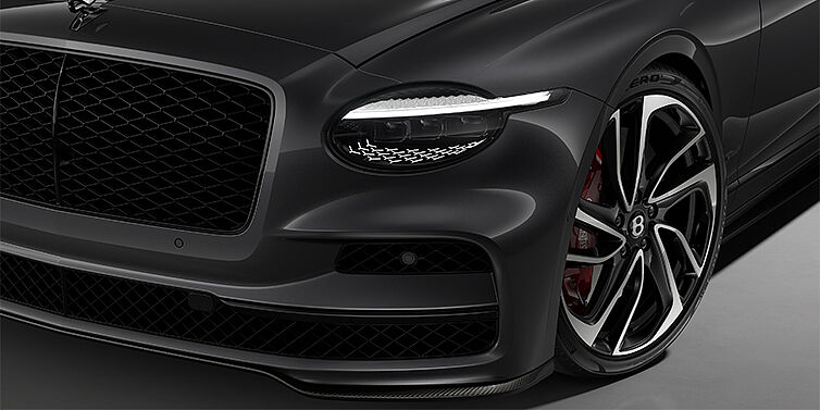 Bentley Hamburg New Bentley Flying Spur Speed sedan head lamp against Magnetic paint with 22" Swept spoke Black & Machined wheel