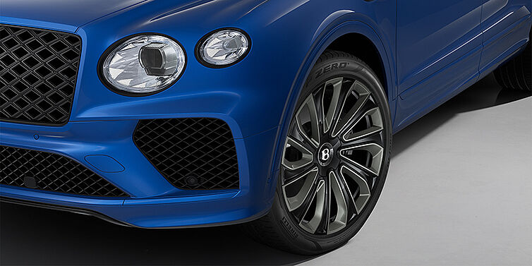 Bentley Hamburg Bentley Bentayga Artenara Edition SUV front detail in Sequin Blue paint and 22" Mulliner Gloss Black wheels front 3/4