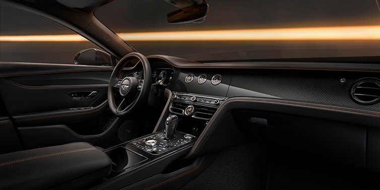 Bentley Hamburg Bentley Flying Spur Black Edition sedan front interior in Beluga black hide with High Gloss Carbon Fibre veneer