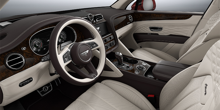 Bentley Hamburg Bentley Bentayga EWB Azure SUV front interior in Linen and Burnt Oak hides with Dark Stained Burr Walnut veneer
