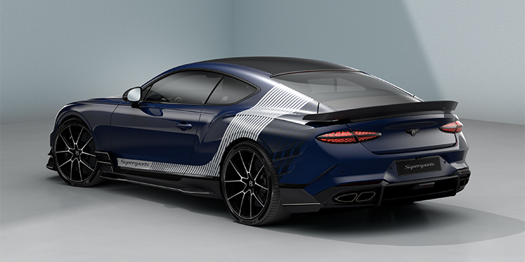 Bentley Hamburg Bentley Supersports rear three quarter in "Skies" Design theme with Electric Blue paint finish and Arctica white and Oxford blue paint stripes across the rear haunch.