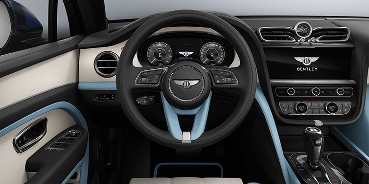 Bentley Hamburg Bentley Bentayga Artenara Edition SUV steering wheel view in Linen and Beluga Black hides with Light Blue accents and Piano Linen veneer